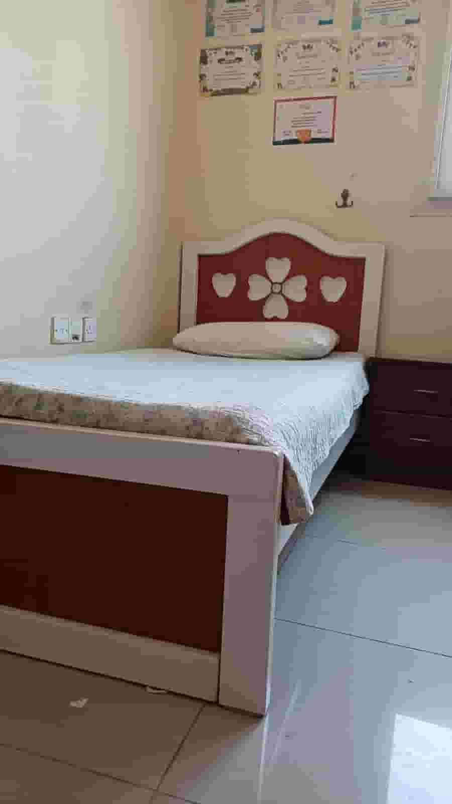 For sale a single bed with a semi-medical mattress 