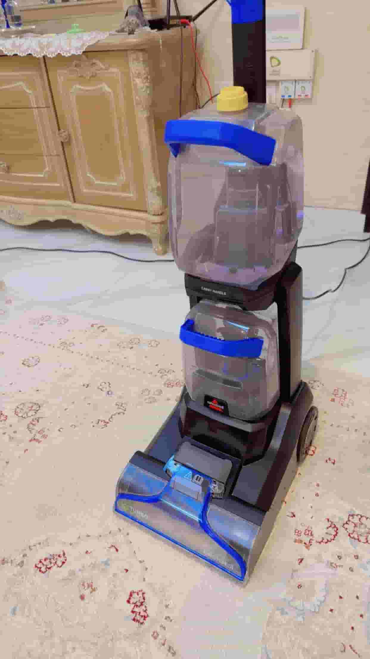 Vacuum cleaner for sweeping and washing carpets 
