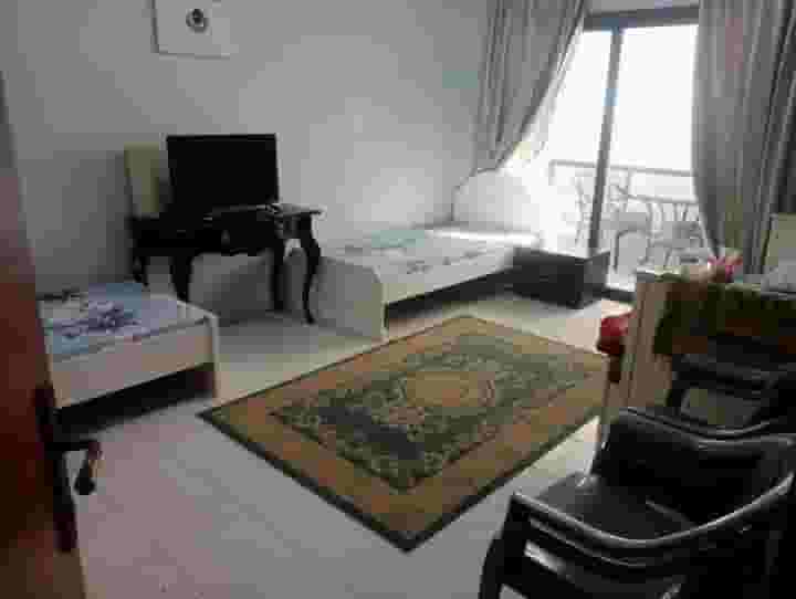 There is 1 bed available for an Arab youth in a large triple room