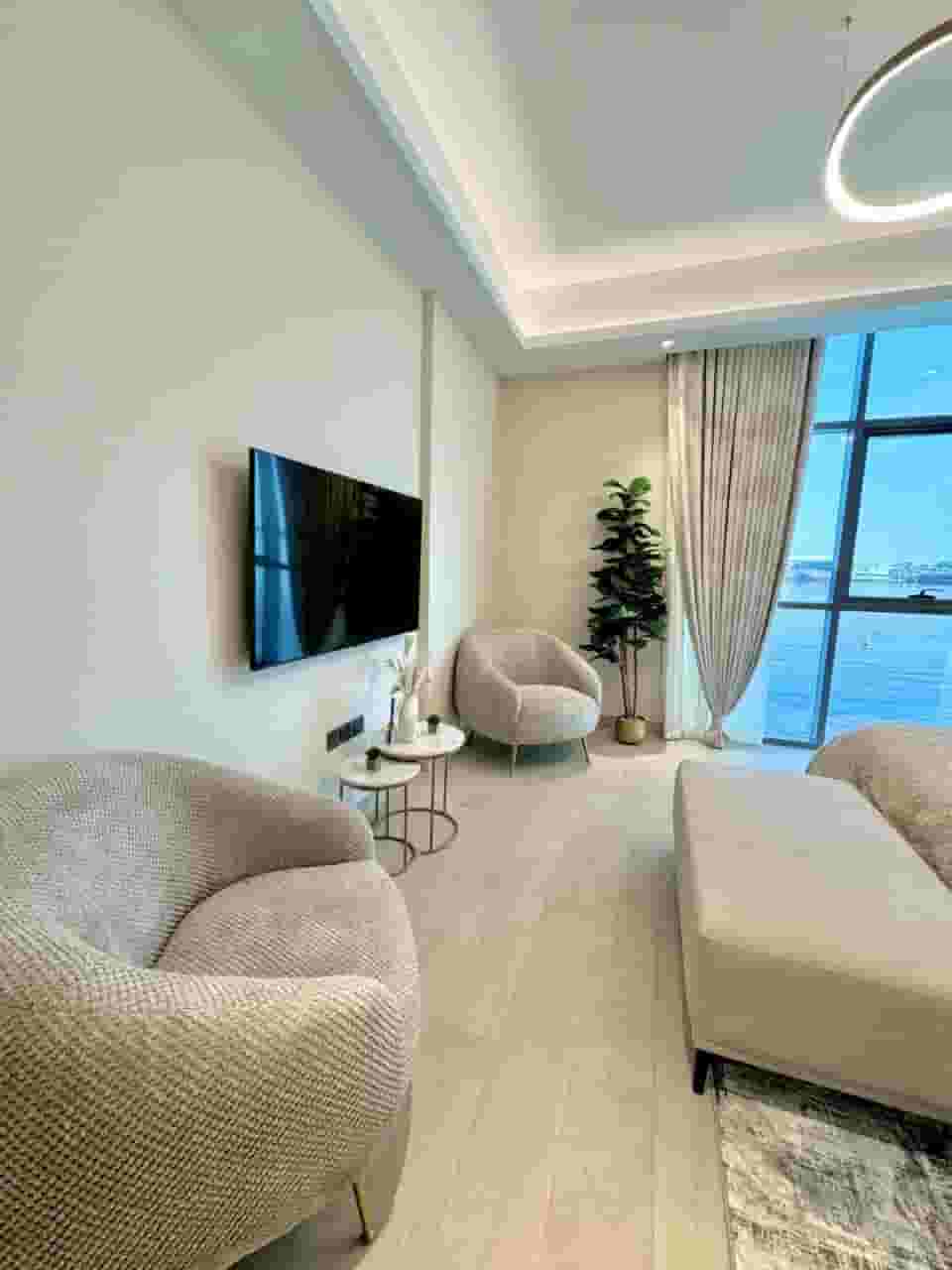 Own your apartment in the most powerful project in Creek Tower Ajman