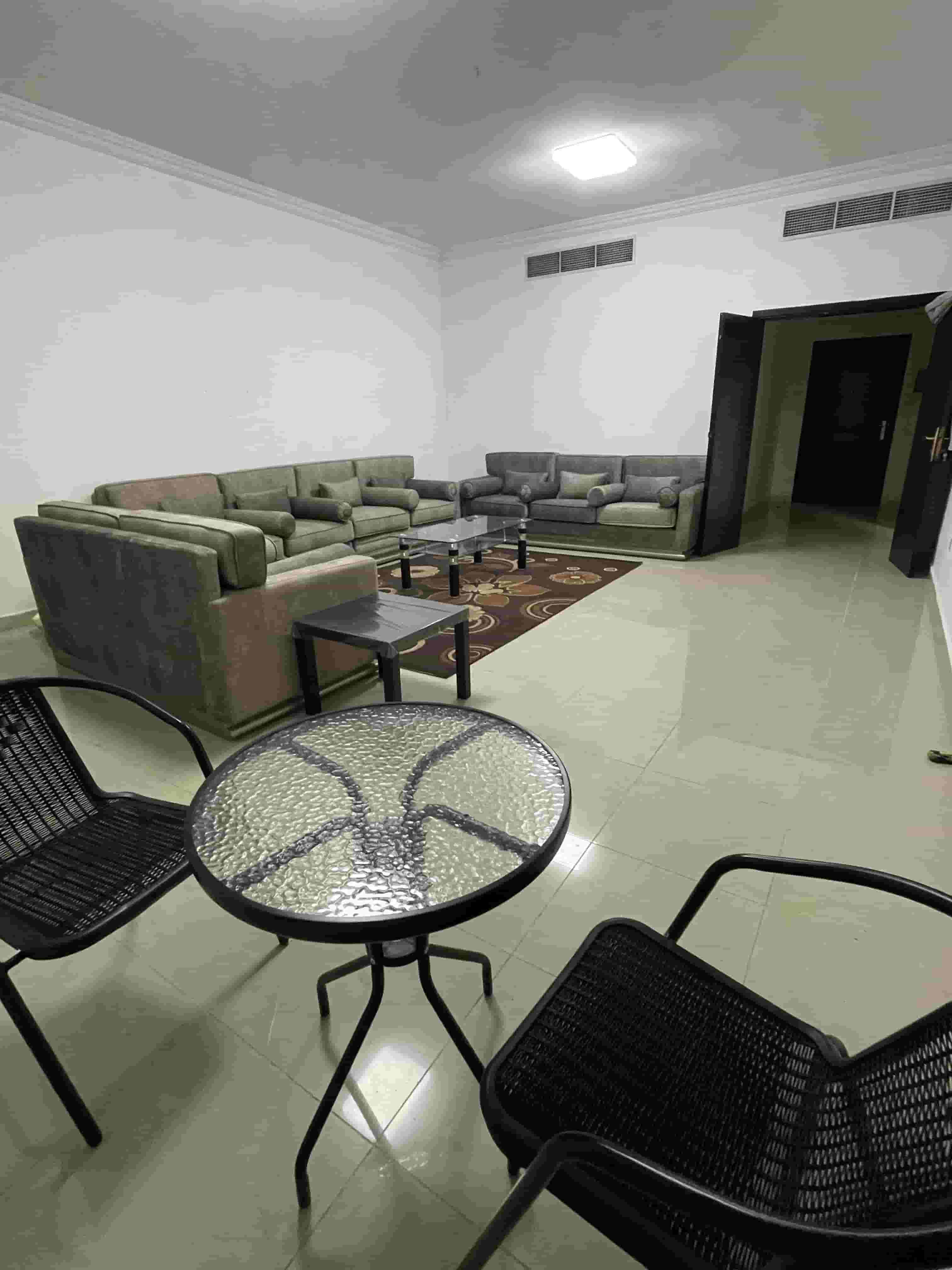 A spacious furnished apartment for rent in Ajman with two rooms and a hall