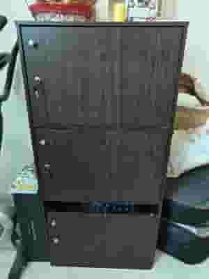 Very large storage compartment in dark brown