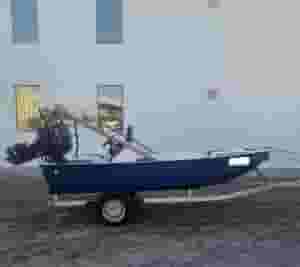 For sale, there is a 14-foot motorcycle with the engine and the truck