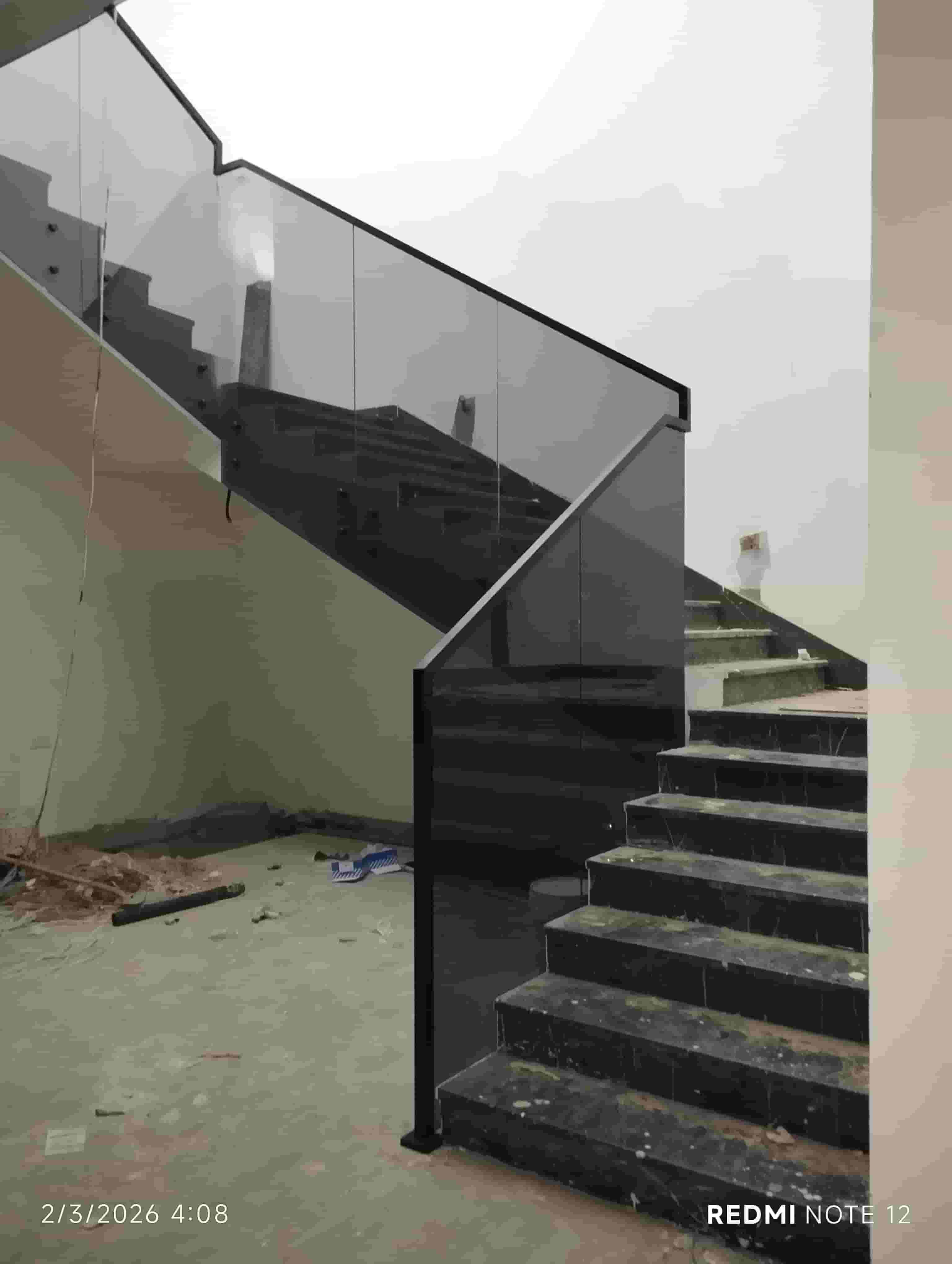 Wrought iron, cast aluminum and glass