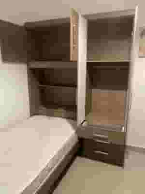 Spacious wardrobe with bed in excellent condition - Pan Emirates brand