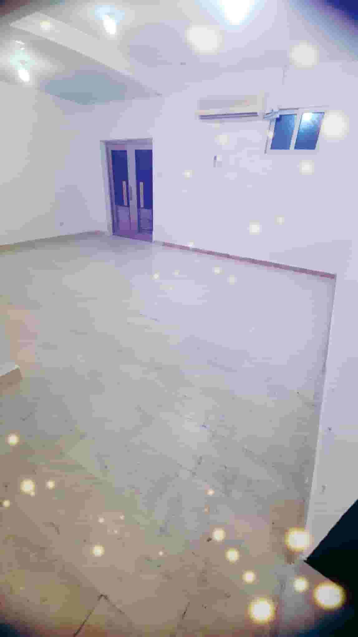 For rent an apartment with a room and a hall with private entrances in passage 31 behind the Abu Dhabi Association