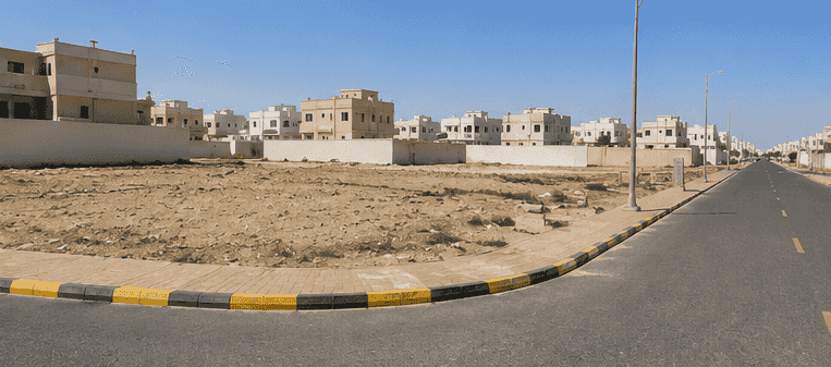 ارض سكنيه زاويه للبيع ف التله 2 بعجمان تصريح ارضي + 2 مساحه كبيرة