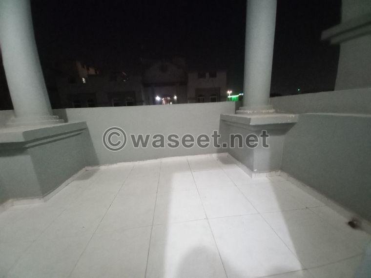 A one-bedroom apartment with a balcony for rent in Khalifa A 5