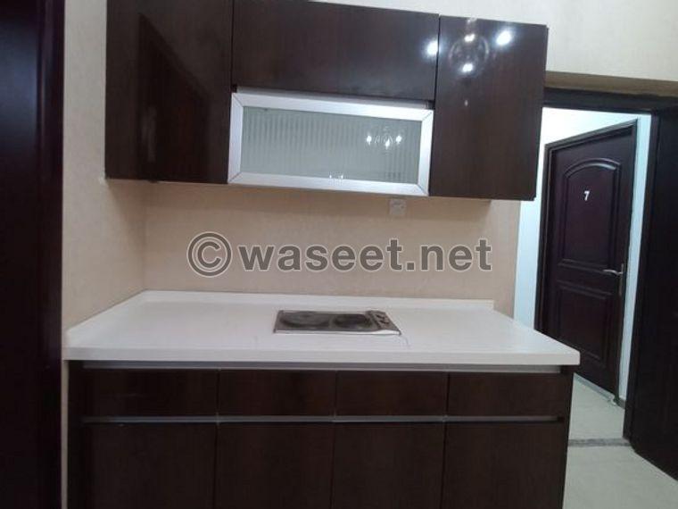 A one-bedroom apartment with a balcony for rent in Khalifa A 2