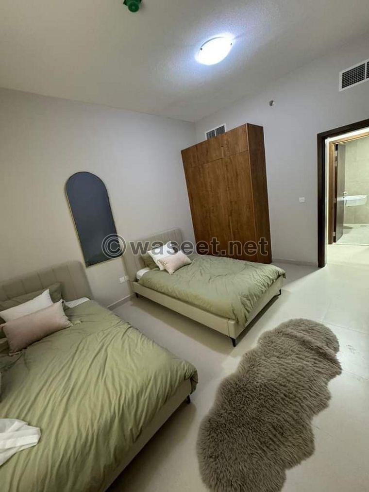 Two-bedroom apartment and a living room in Al-Amira Village  3