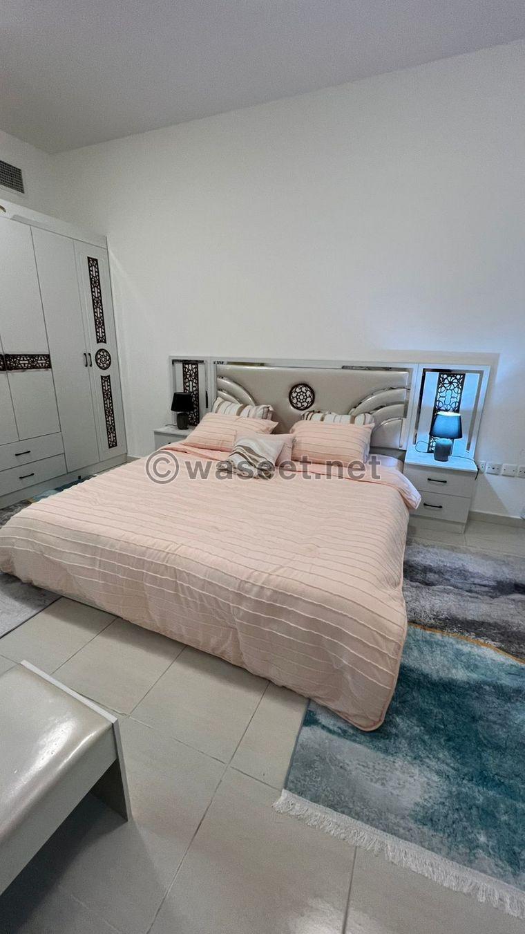 For sale, a one-bedroom apartment in Sharjah with hotel furnishings 5