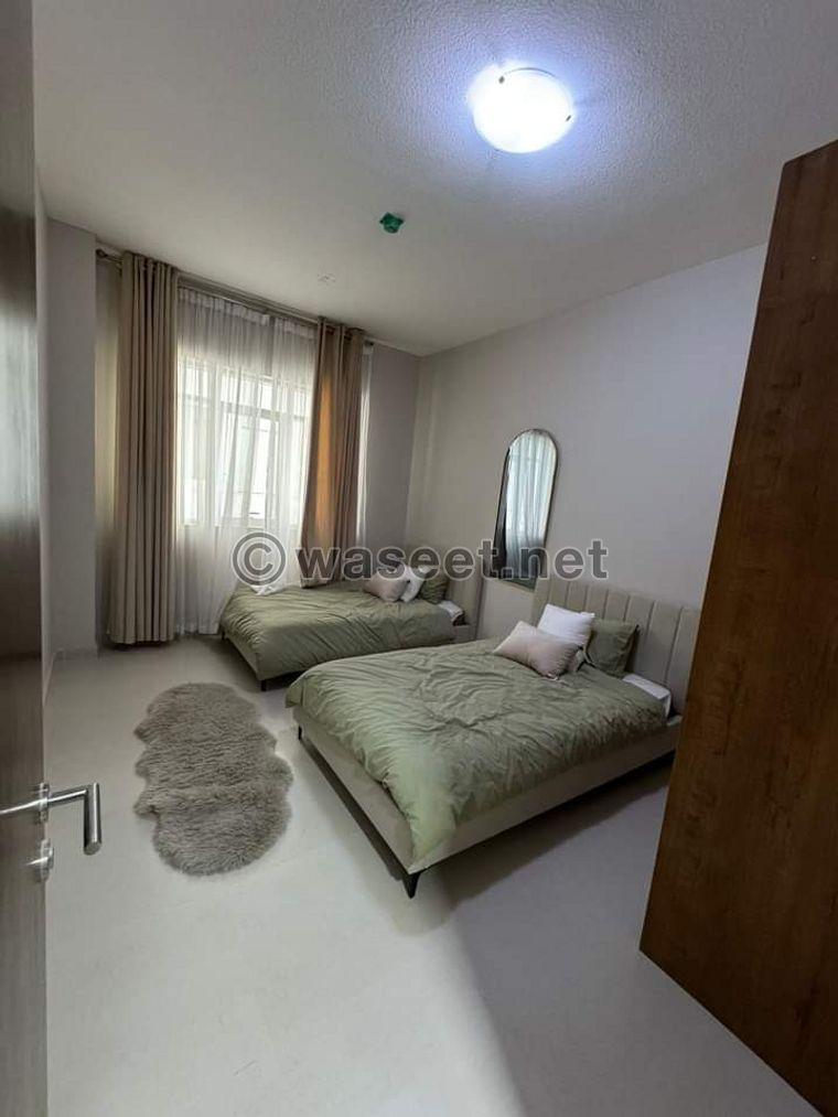 Two-bedroom apartment and a living room in Al-Amira Village  2