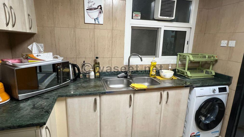 For sale, a one-bedroom apartment in Sharjah with hotel furnishings 9