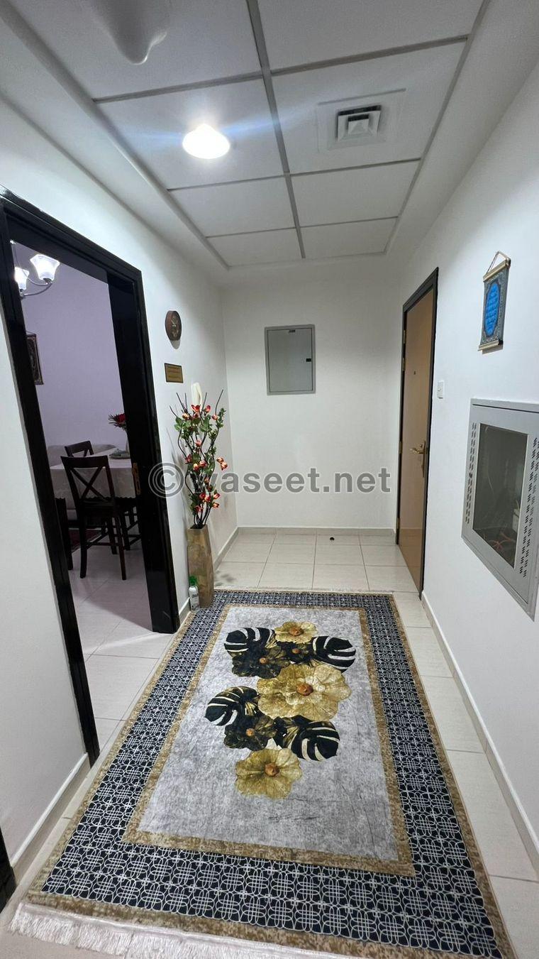 For sale, a one-bedroom apartment in Sharjah with hotel furnishings 8