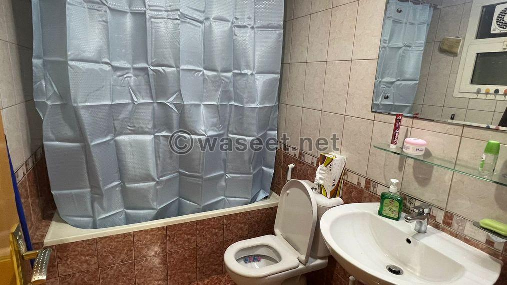 For sale, a one-bedroom apartment in Sharjah with hotel furnishings 10