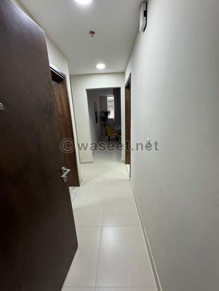 Two-bedroom apartment and a living room in Al-Amira Village  8