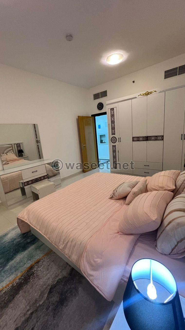 For sale, a one-bedroom apartment in Sharjah with hotel furnishings 6