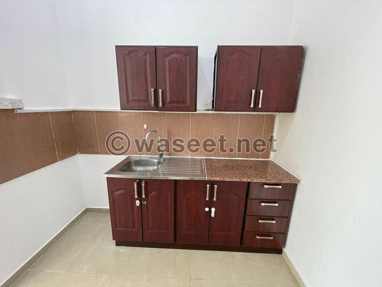 For rent, a one-bedroom apartment with a balcony in Khalifa City A  7