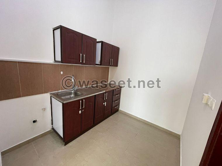 For rent, a one-bedroom apartment with a balcony in Khalifa City A  8