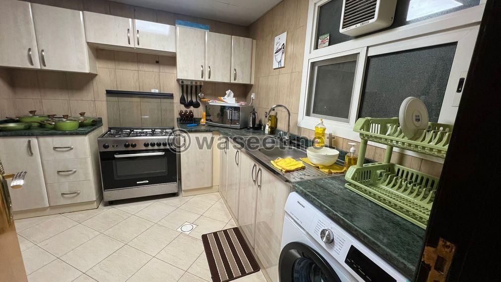 For sale, a one-bedroom apartment in Sharjah with hotel furnishings 7