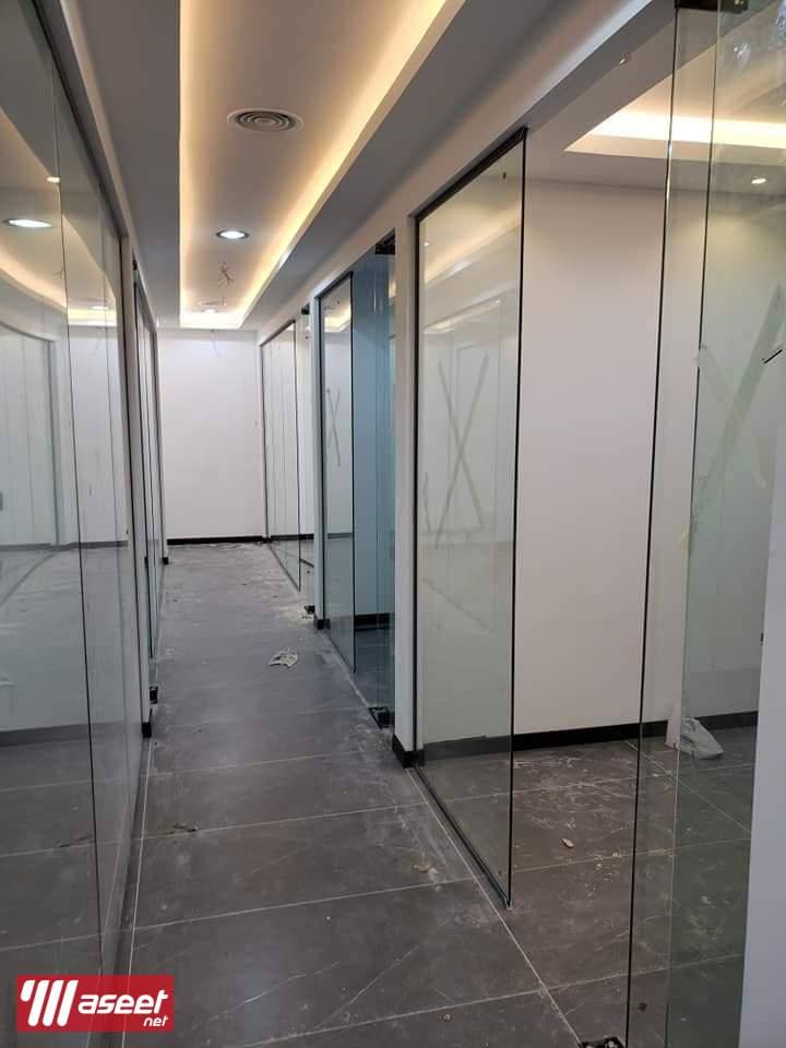 Supply and installation of glass 11