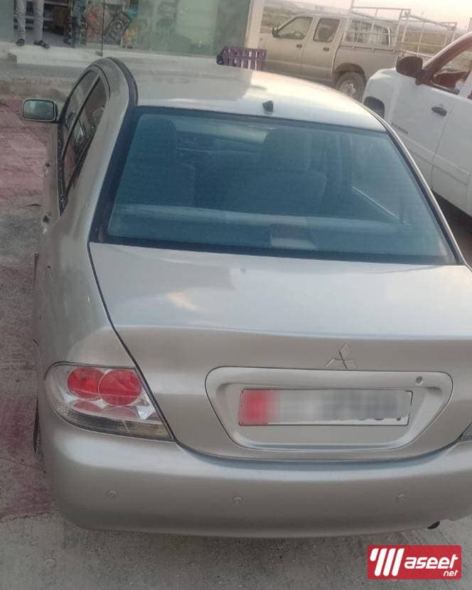 سيارة ميتسوبيشي لانس2009 1