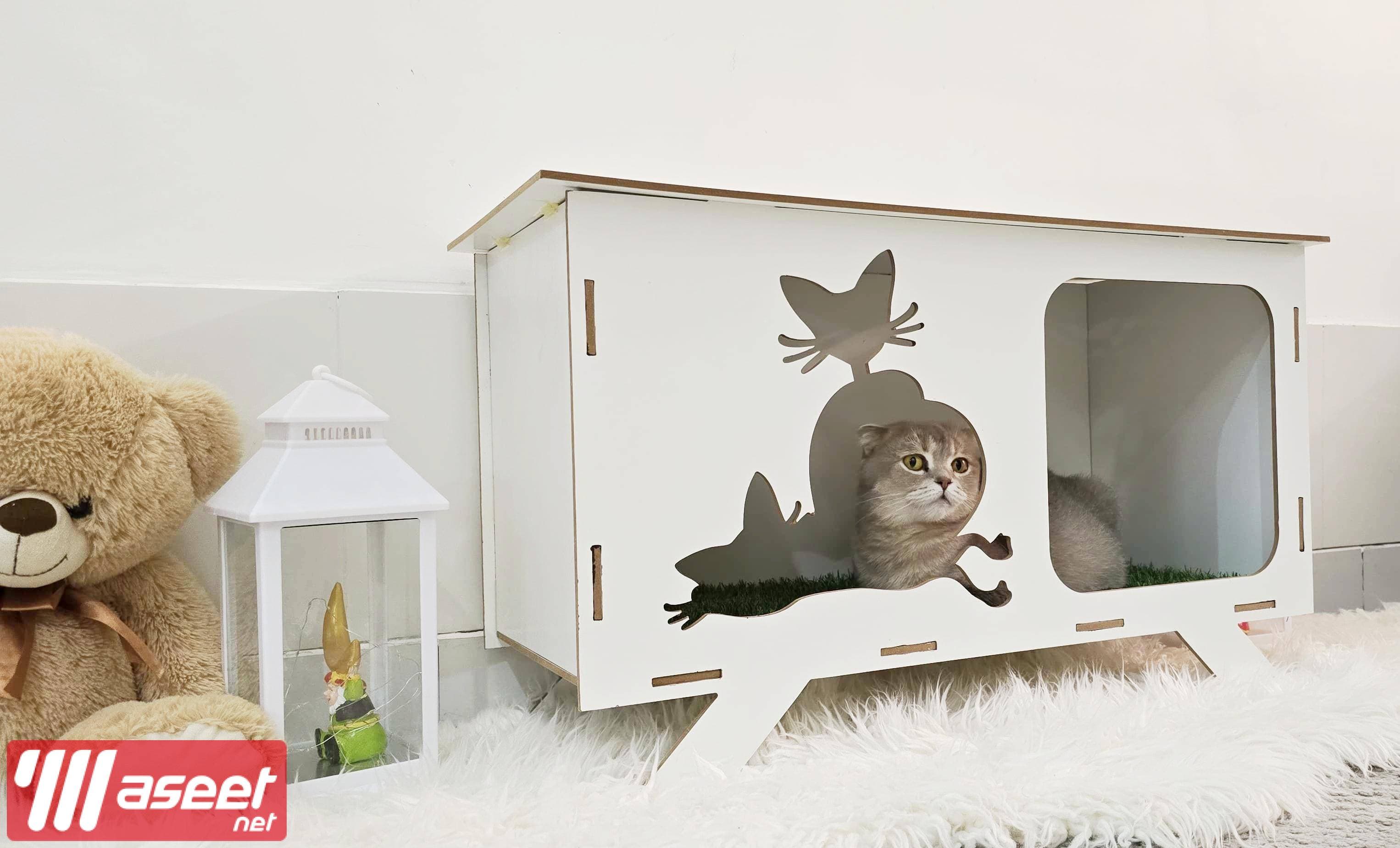 A cat house made of wood 1