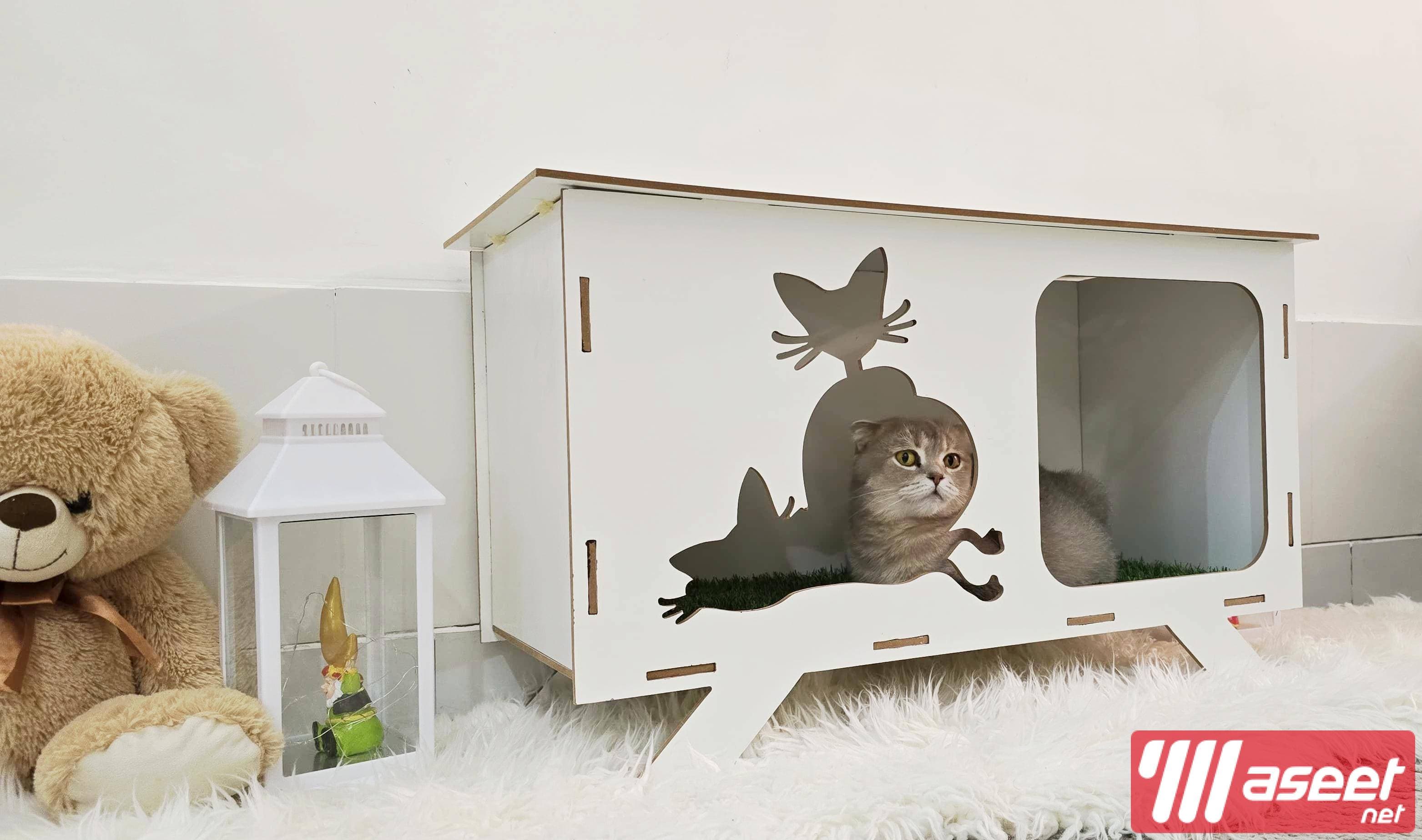 A cat house made of wood 2