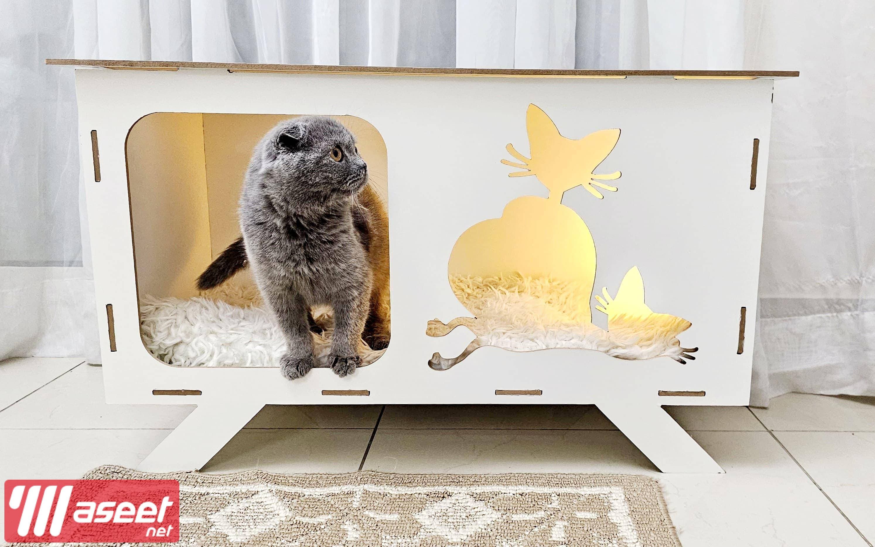 A cat house made of wood 5