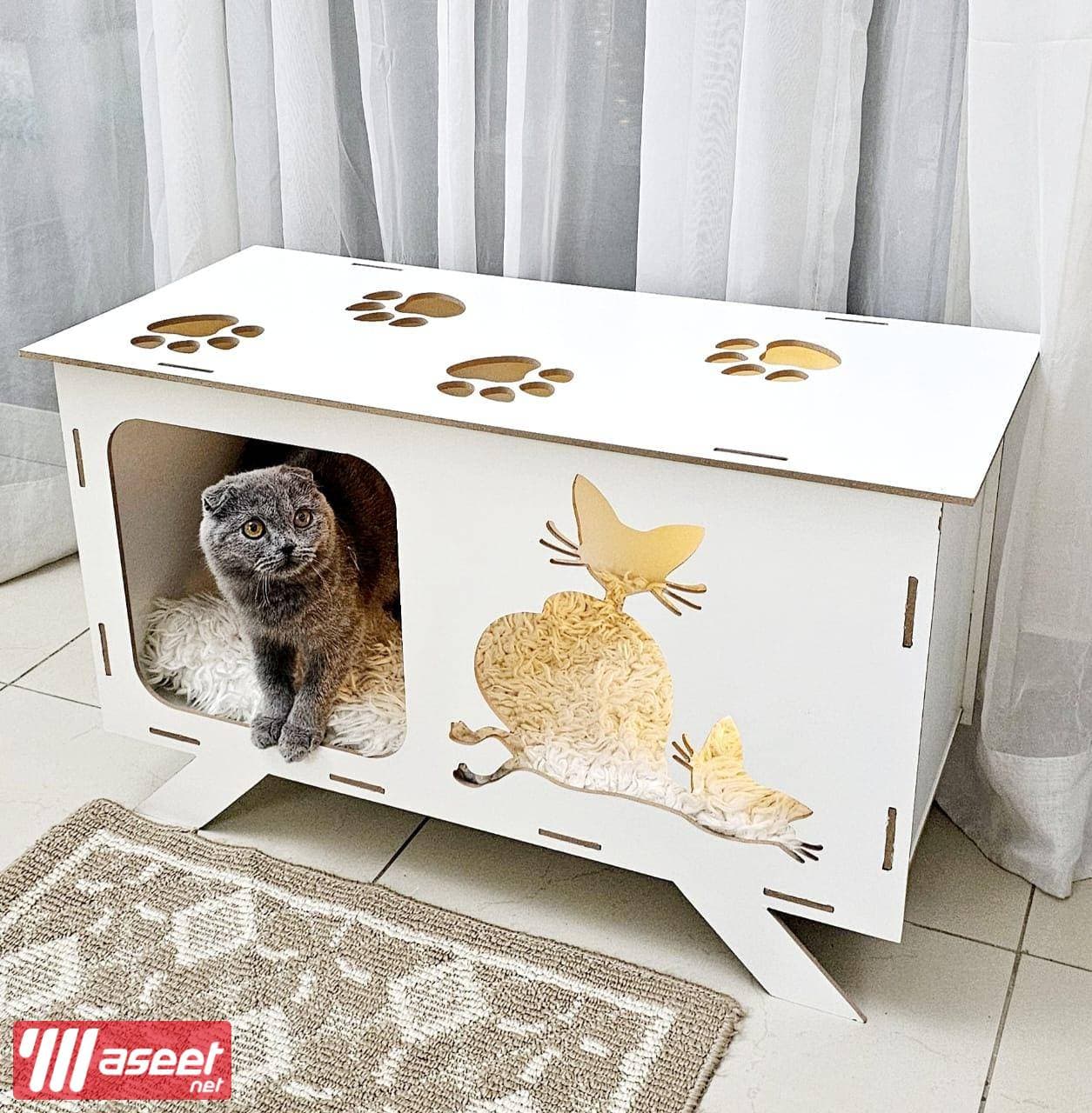 A cat house made of wood 6