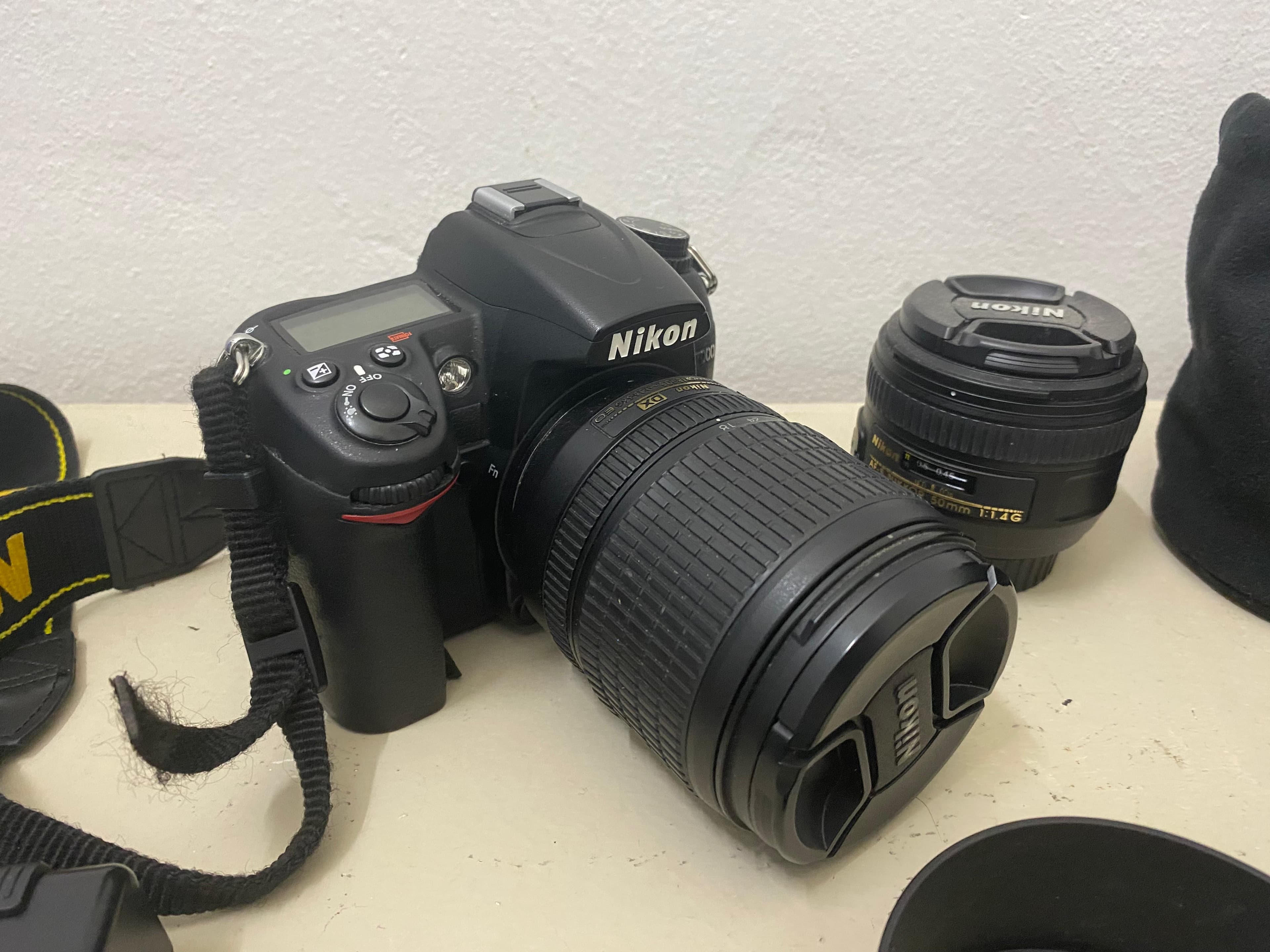 نيكون D7000 بحالة ممتازة مع عدسة 18-105 وعدسة 50 مم 1