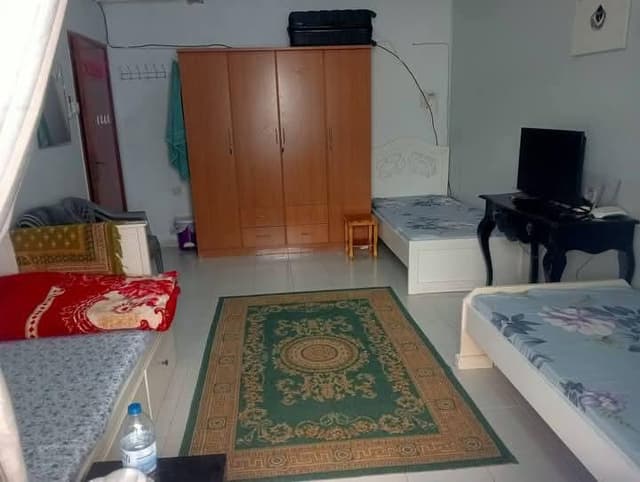 There is 1 bed available for an Arab youth in a large triple room