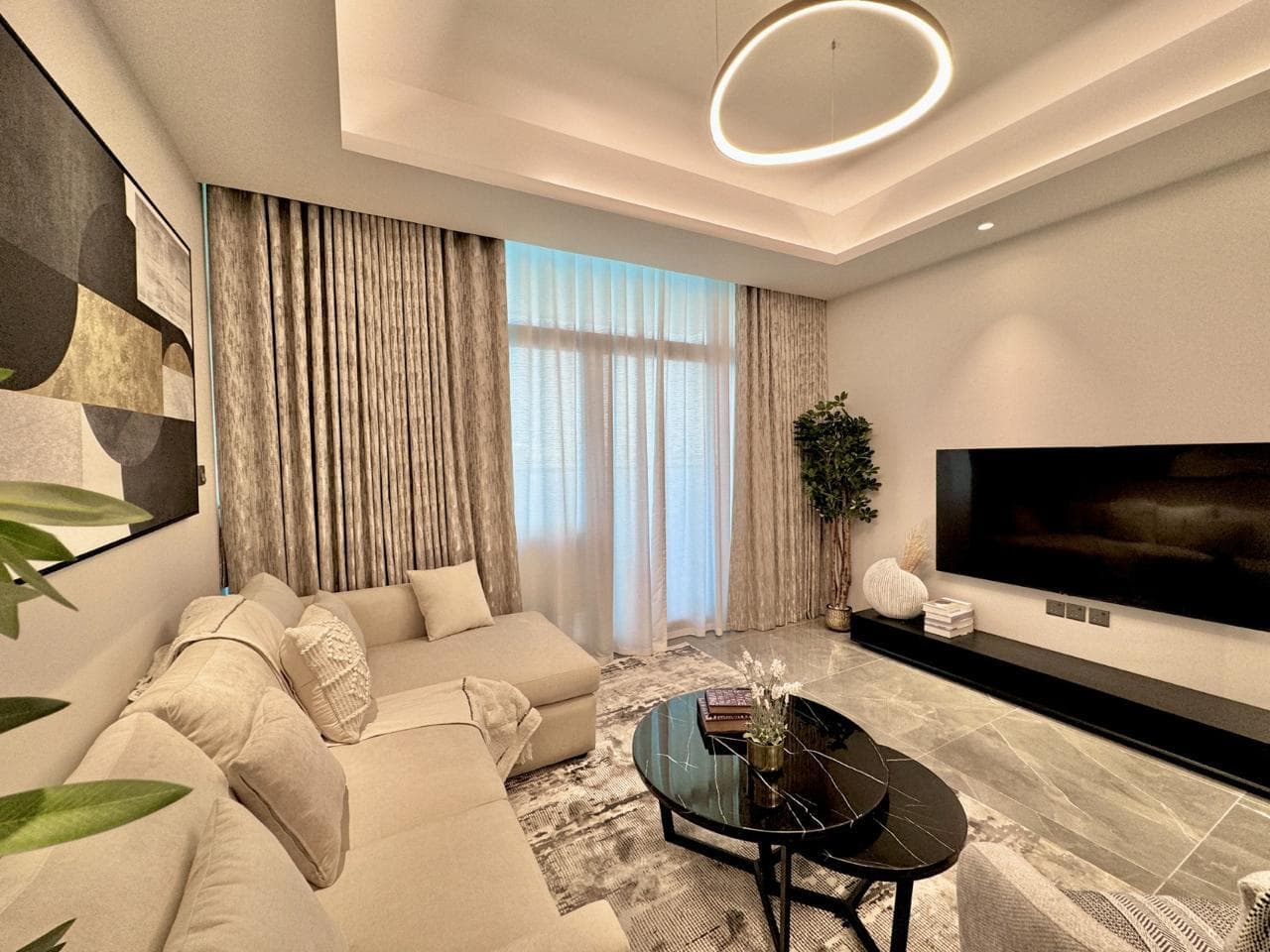 Own your apartment in the most powerful project in Creek Tower Ajman 1