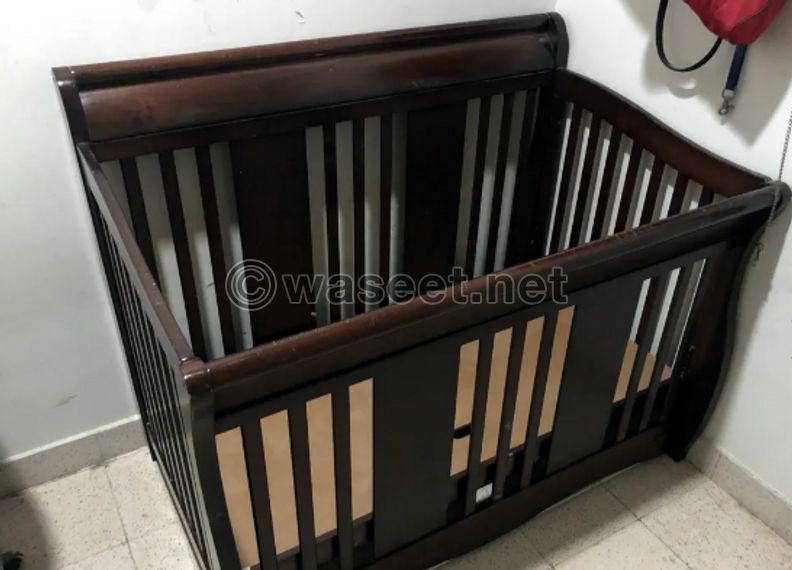 Wooden baby bed 0