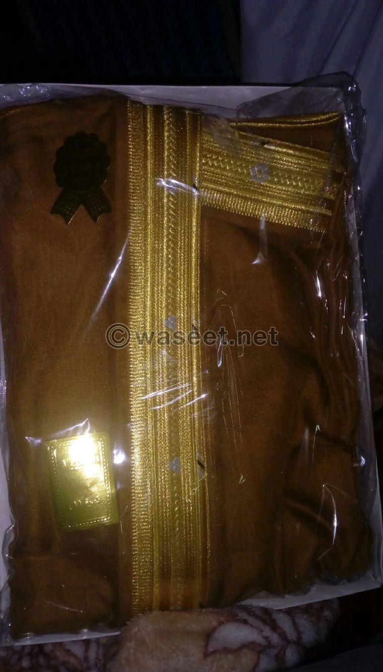 There is a men's abaya for sale 0