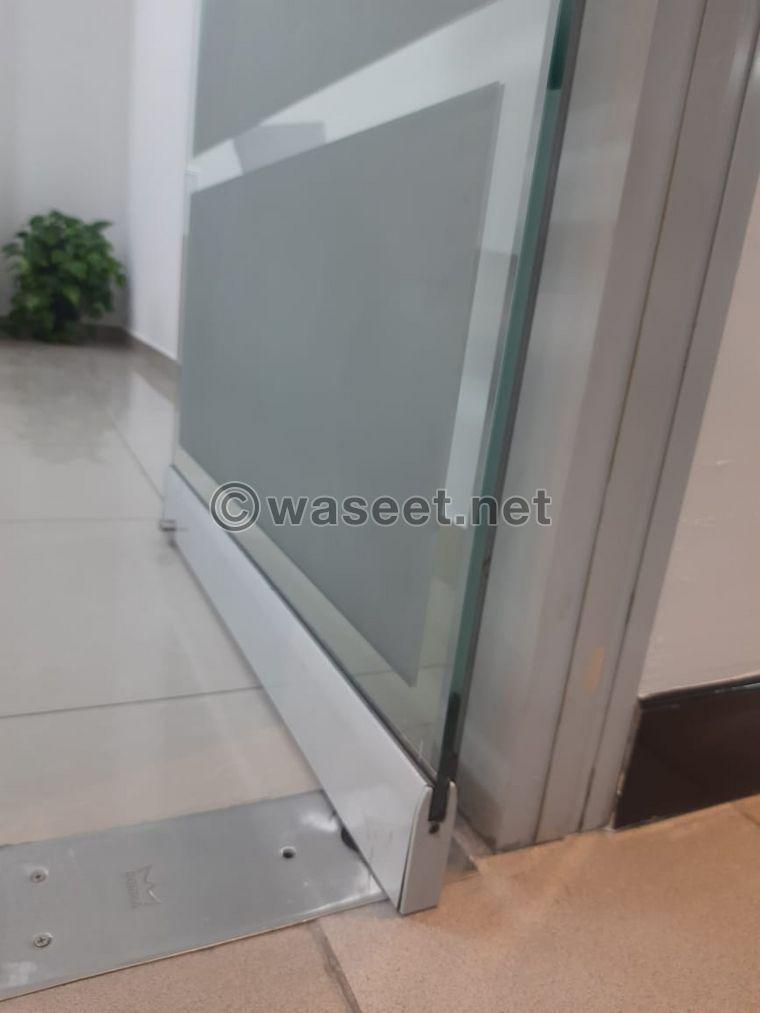 شركة تصليح الأبواب الزجاجية في دبي  2