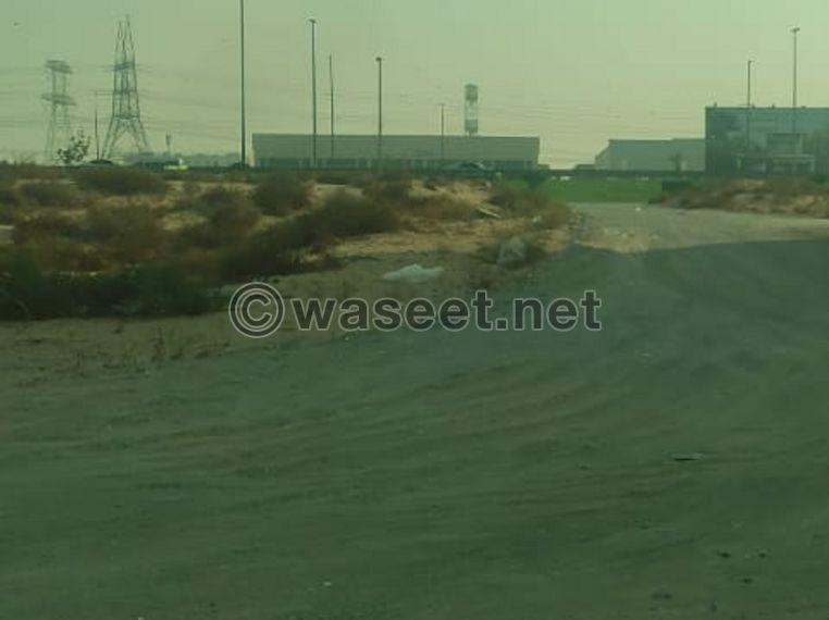 Commercial land for sale in Rawdat Al Qart in a great location 0