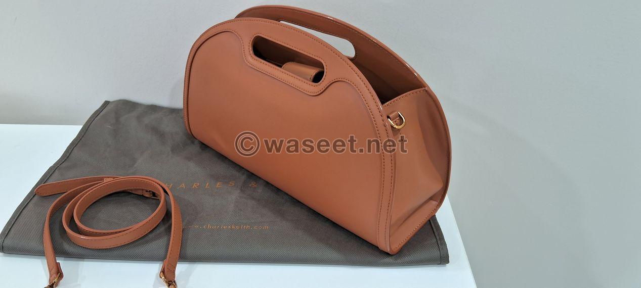 Camel vegan leather handbag 0