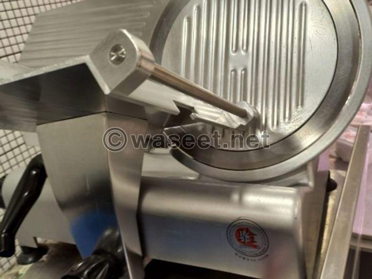 Used machine for sale to cut mortadella and cheese  0