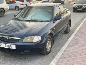 Mazda 323 model 2003 in excellent condition 