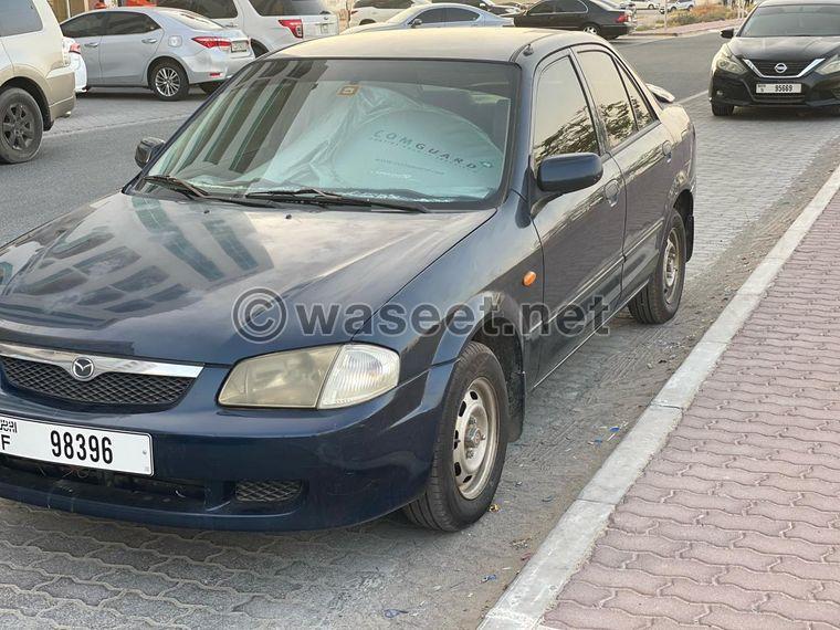 Mazda 323 model 2003 in excellent condition  0