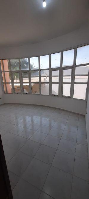 A room and a lounge in Al Muroor, close to Al Bateen Airport, for rent