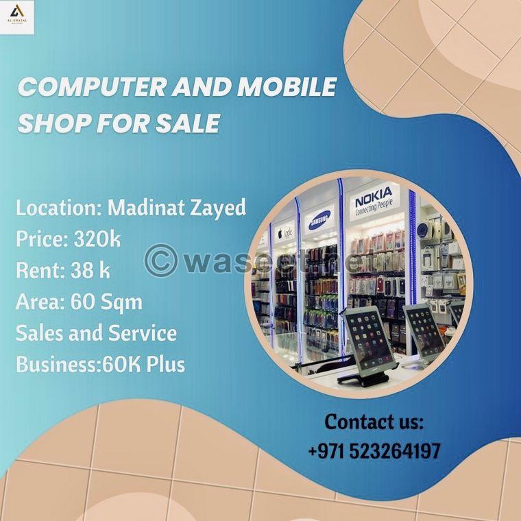 Computer and mobile store for sale in Madinat Zayed 0