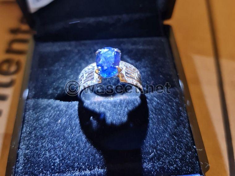 Diamond ring with rare gemstone and white gold 0