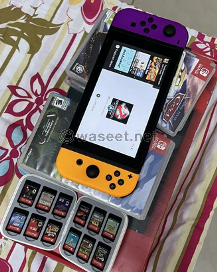  Nintendo Switch with 16 original games and hands  0