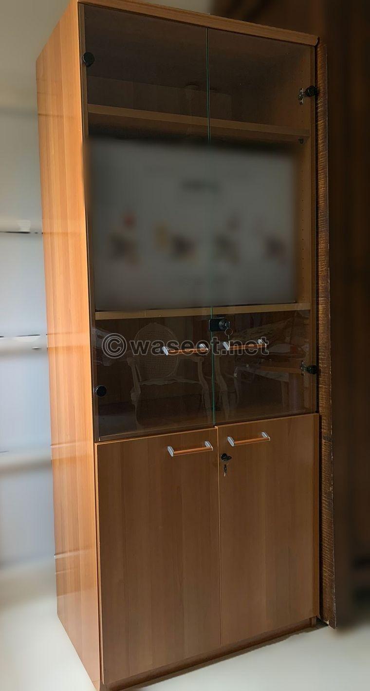 Wooden wardrobe with glass doors  0